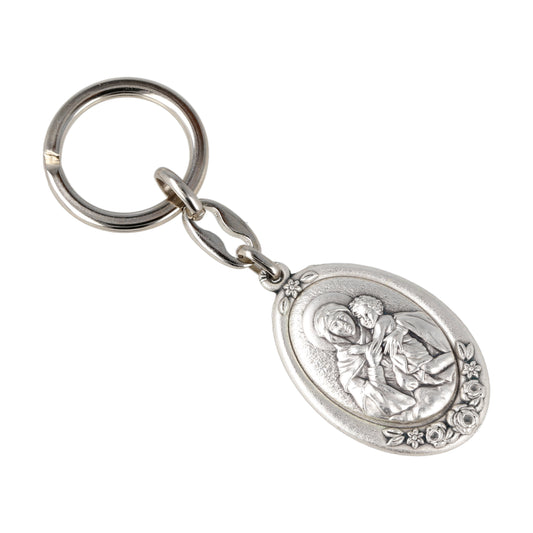 Keychain Schoenstatt Oval Silver With Flowers. Souvenirs from Italy